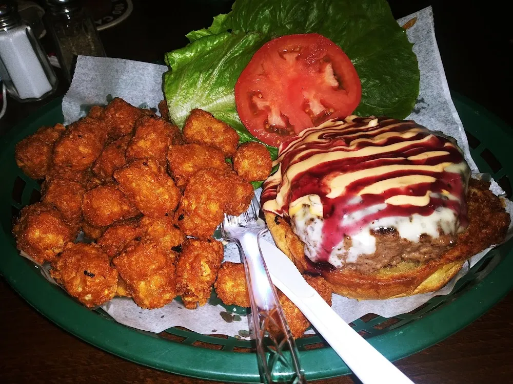 Signature Burger with Signature and Melba Sauce with Lettuce and Tomato and Tots