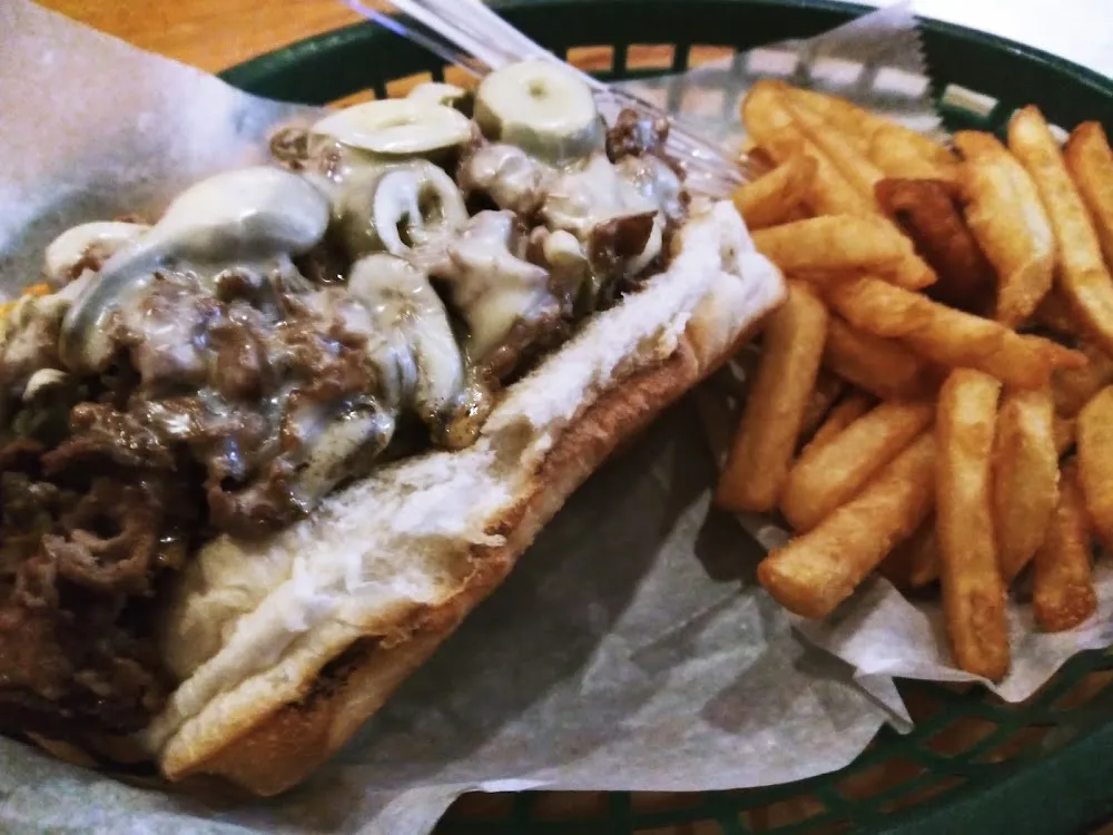 Steak and Cheese Sub with Hot Buffalo Chicken Tenders Plus Blue Cheese and Jalapenos